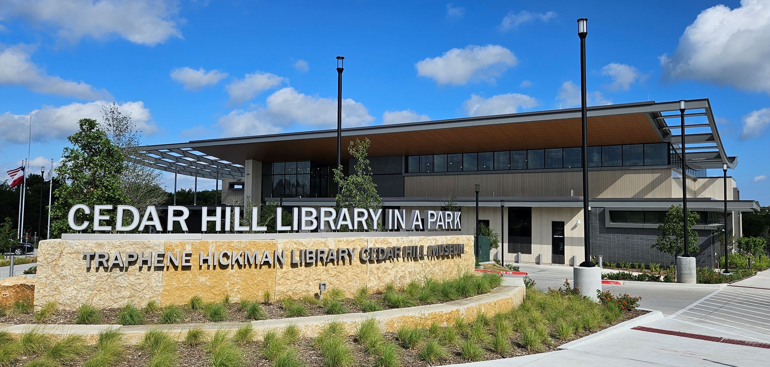 Sunny photo of Library entrance outside